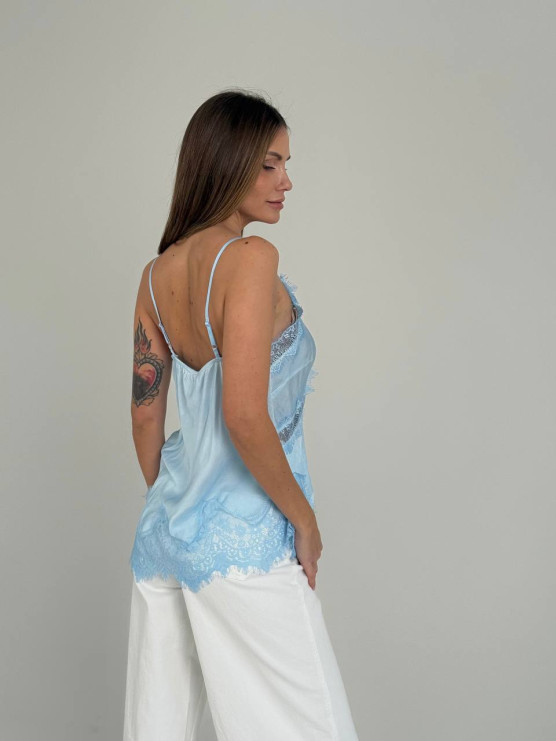 Топ із мереживом та асиметричним низом AZZURO